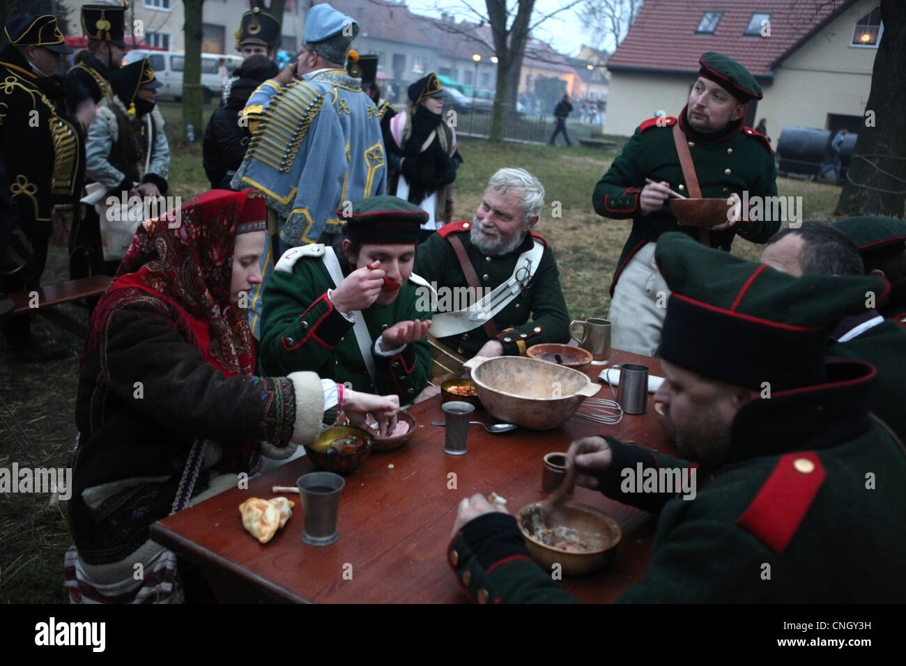 Russian soldiers eat in the military camp in Tvarozna, Czech Republic. Re-enactment of the Battle of Austerlitz (1805). Stock Photo