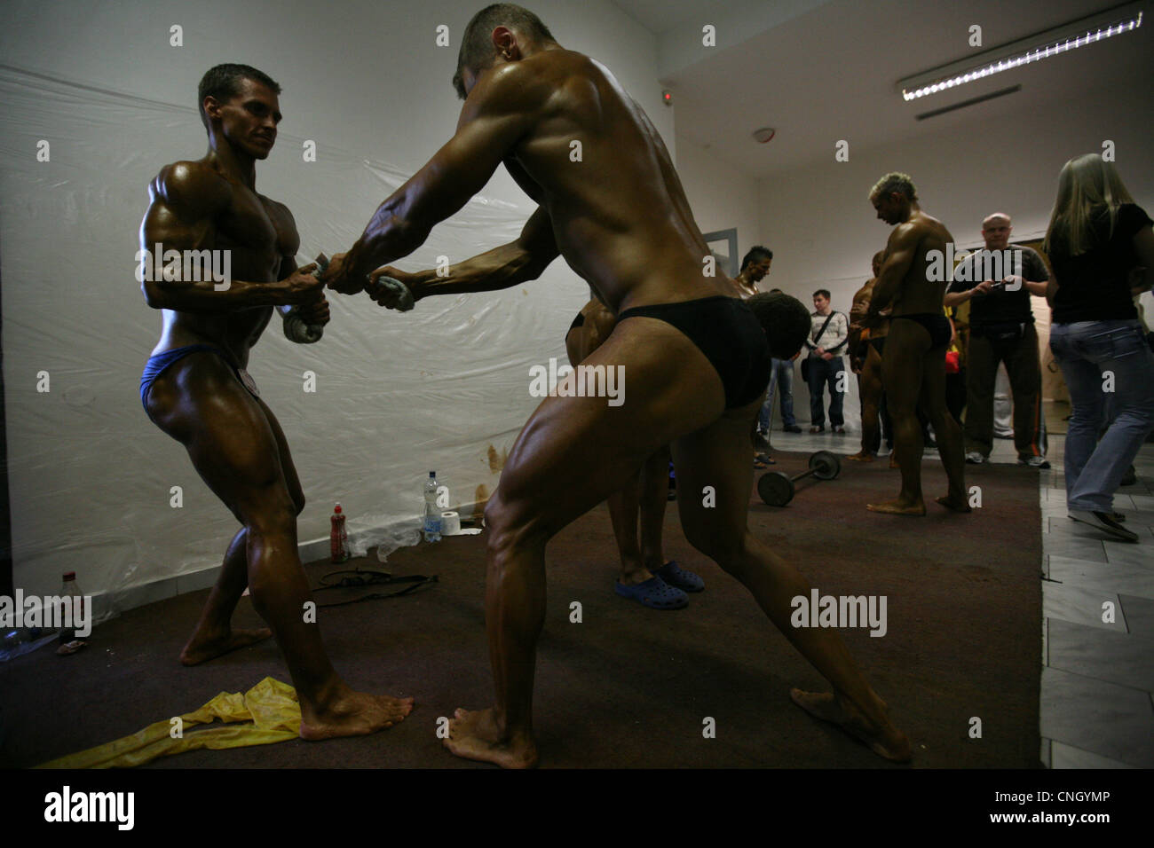 Czech national championship in natural bodybuilding. Bodybuilders warming up for the competition. Stock Photo