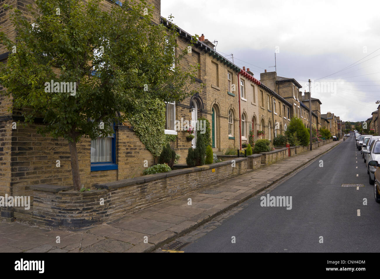 Terraced housing built for the workers of Saltaire mill in the city of leeds bradford in west yorkshire Stock Photo