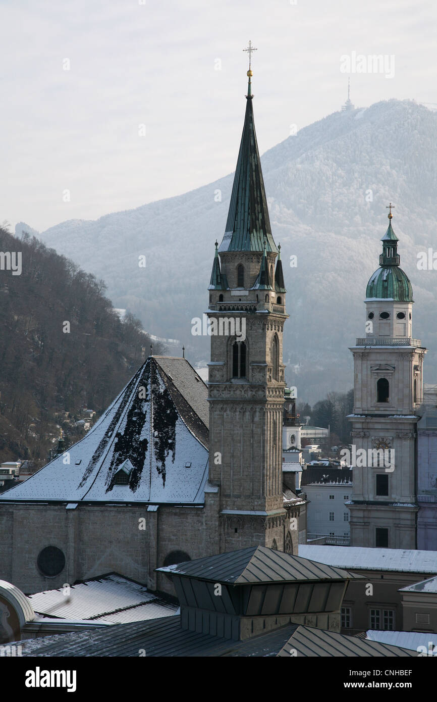 Franziskanerkirche and the tower the Salzburg Cathedral in the ...