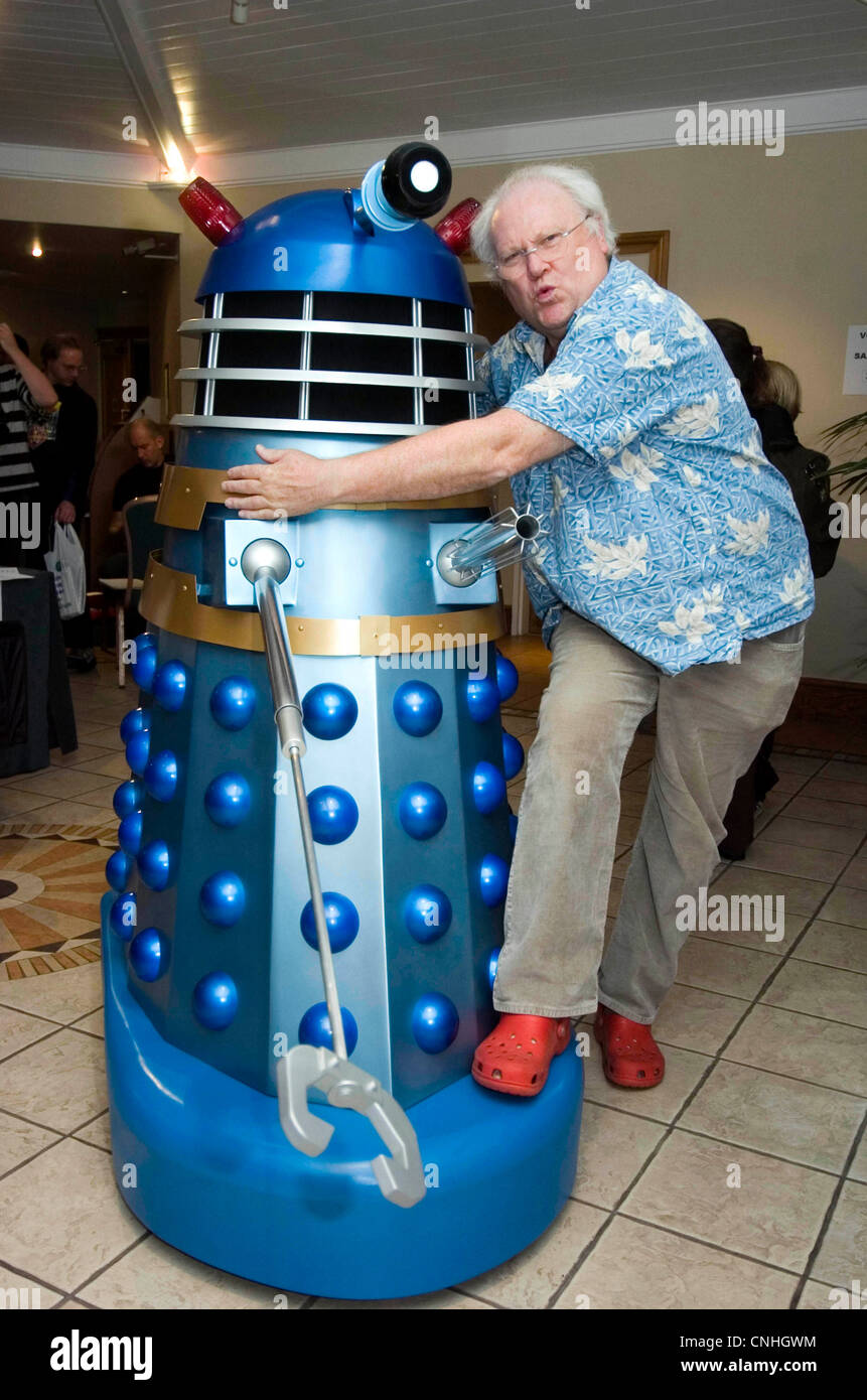 Colin Baker, the actor who played the sixth incarnation of Dr Who is reunited with his old enemy - the daleks. Stock Photo
