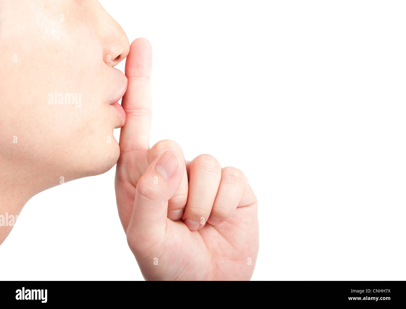 Young man asking for silence Stock Photo