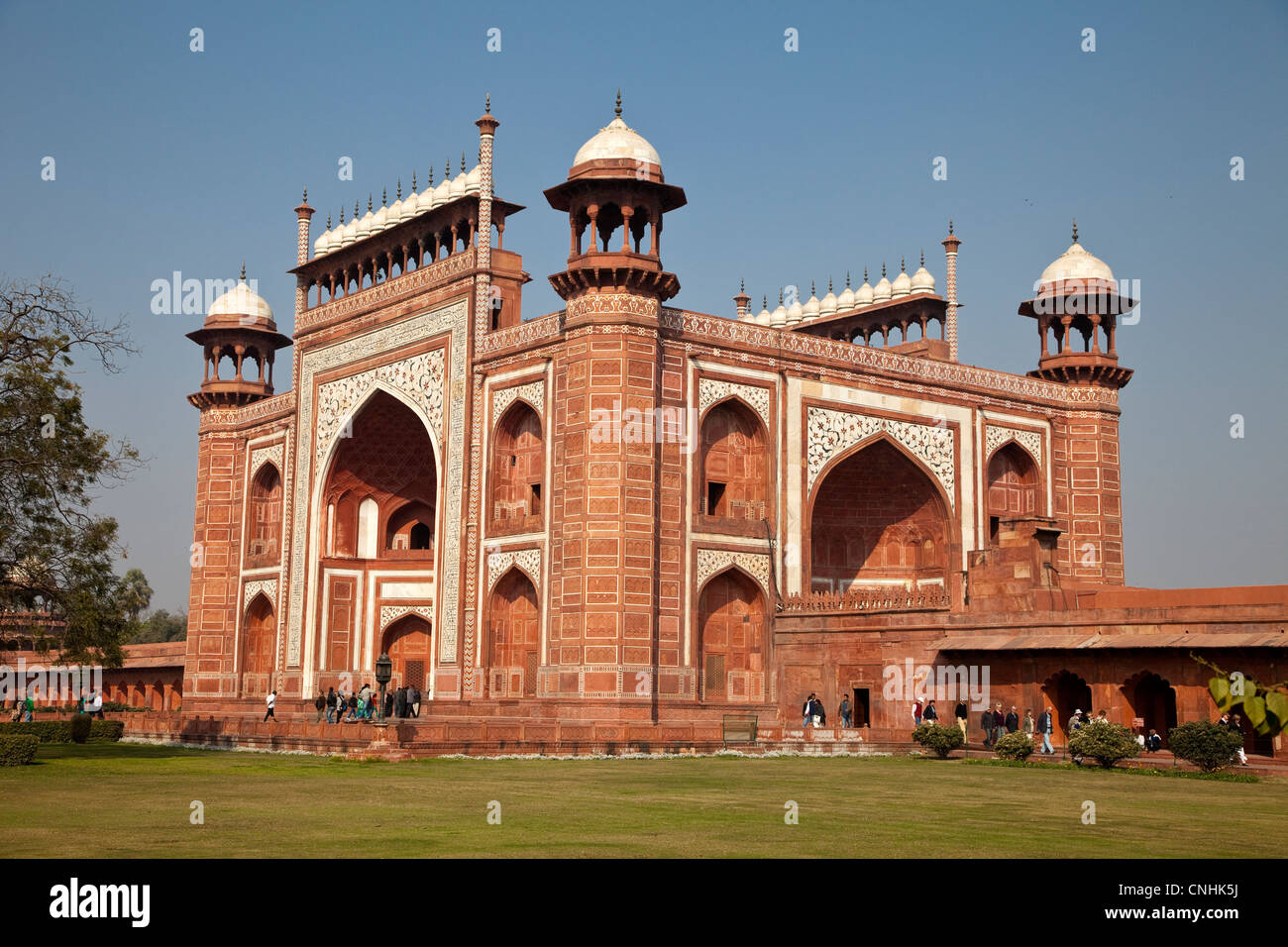 Agra, India. Taj Mahal. Gateway Entrance opening to the Taj and its Gardens. Chhatris on Corners, Decorative Domes on Top. Stock Photo