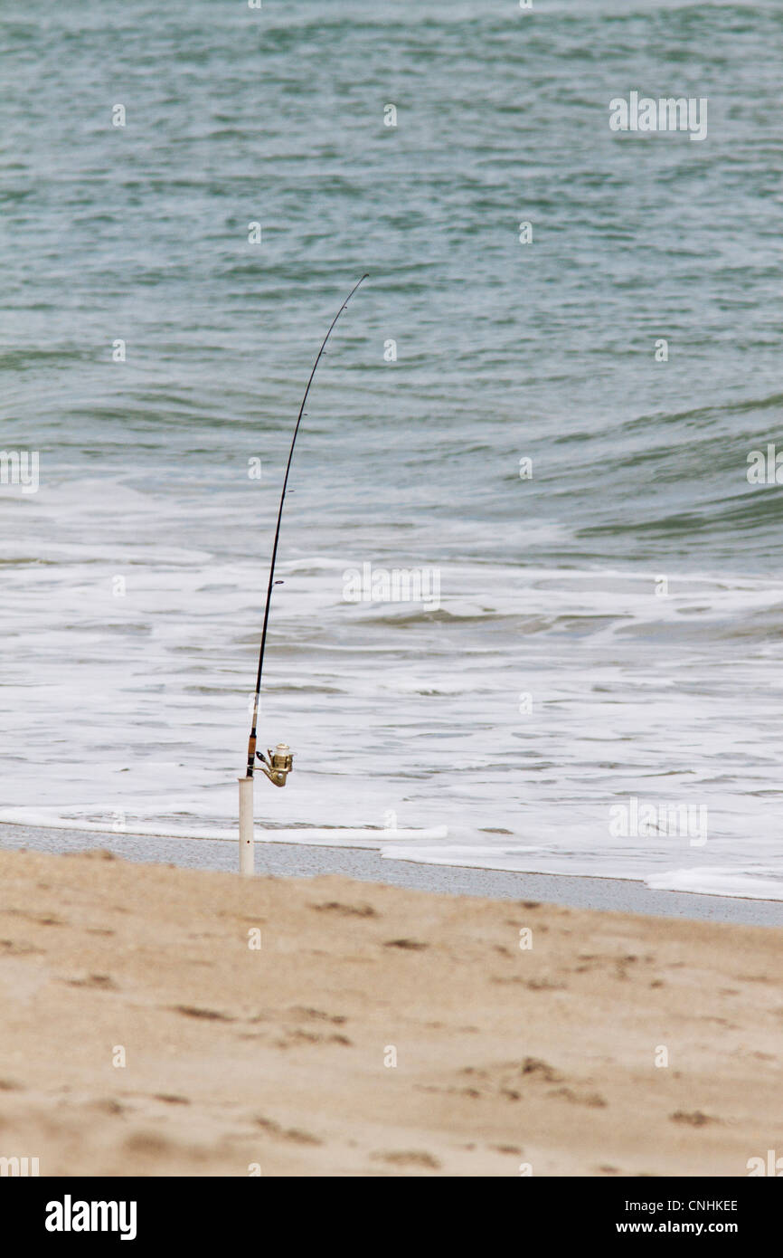 Fishing pole beach hi-res stock photography and images - Alamy