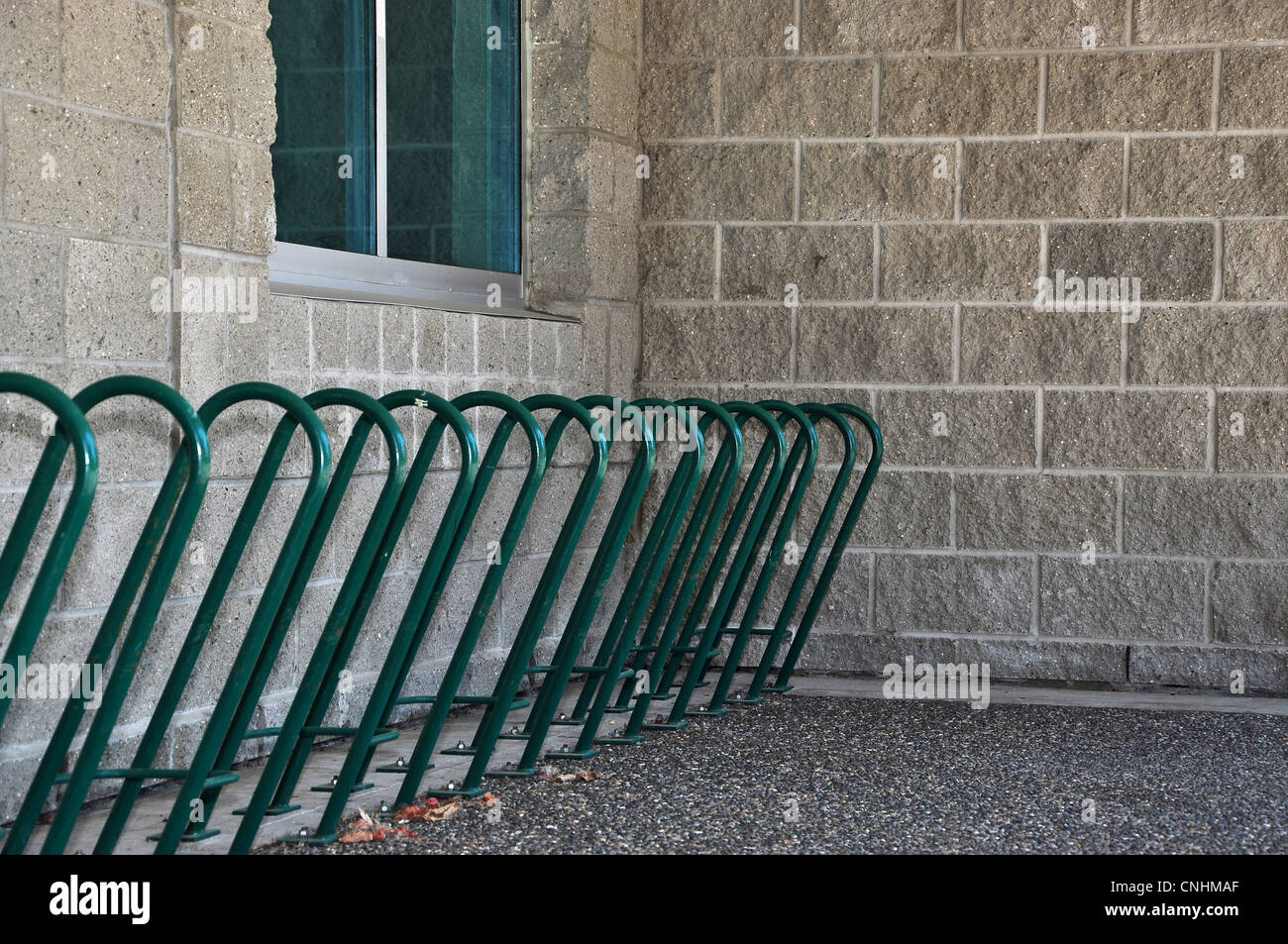 Empty metal industrial blue bike rack Stock Photo