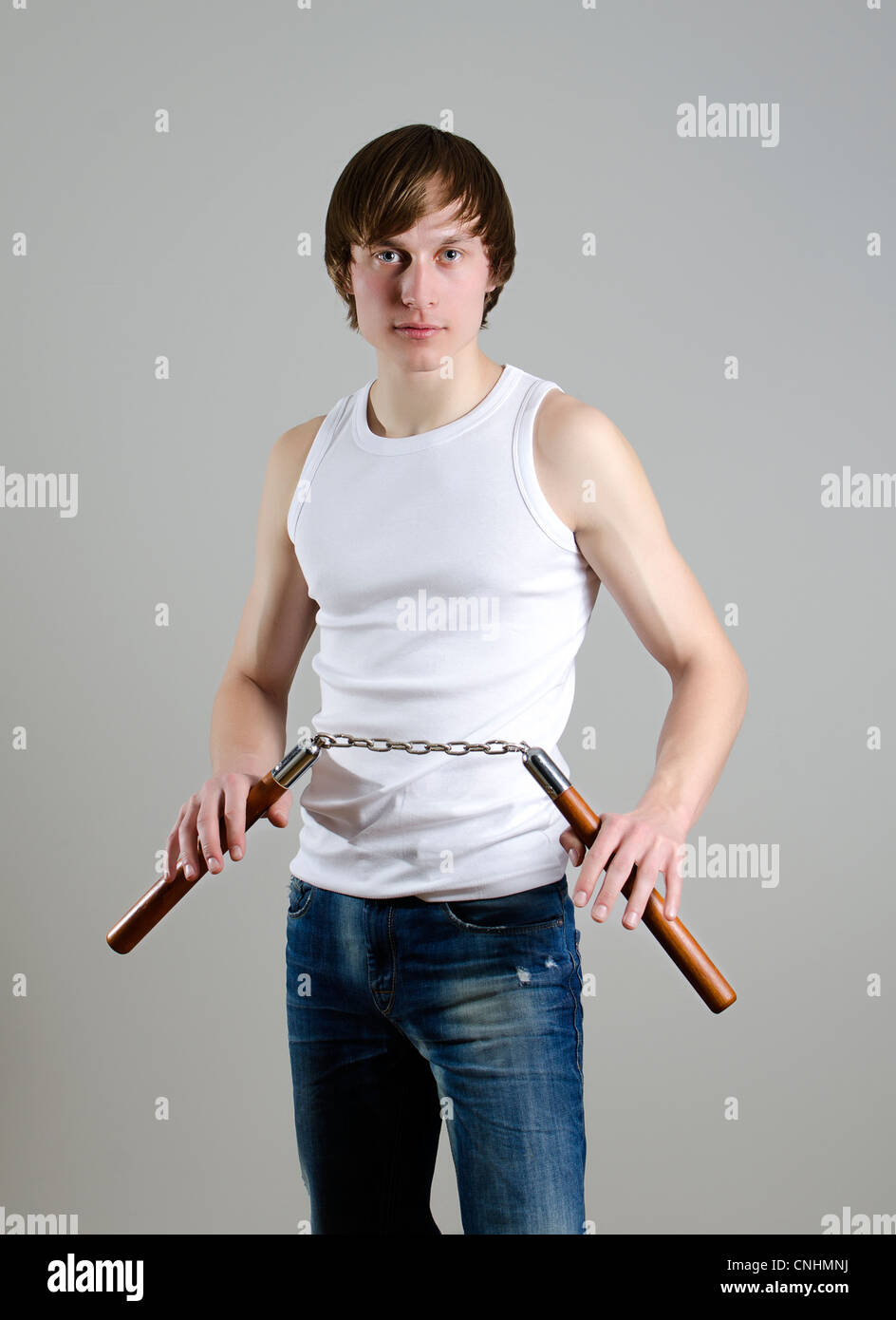 Martial Art. Man with nunchucks Stock Photo Alamy