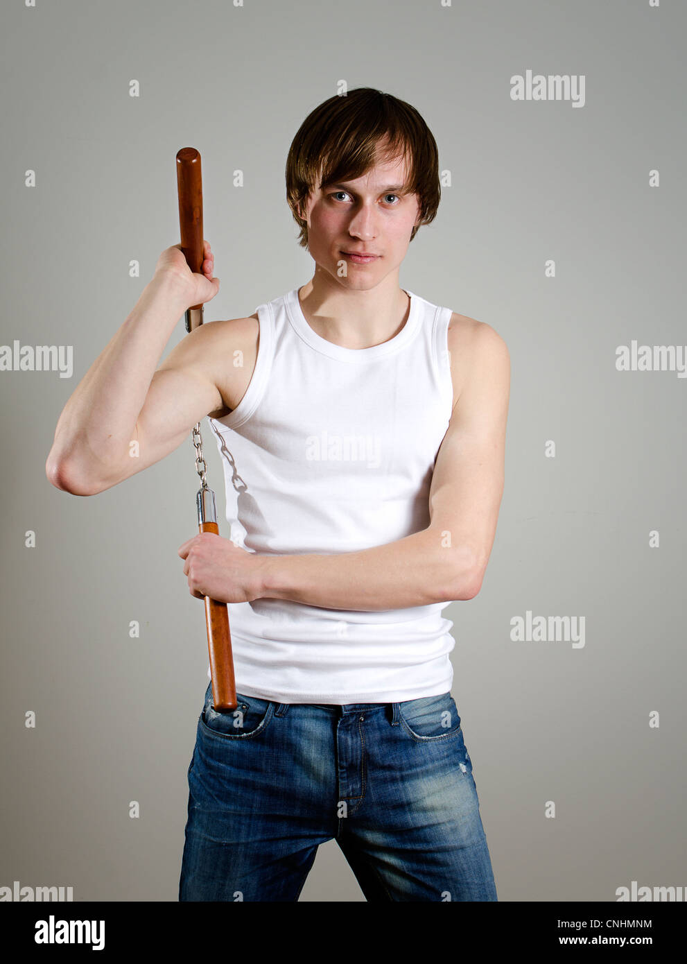 Martial Art Man With Nunchucks Stock Photo Alamy Martial Art Man With Nunchucks Stock Photo Alamy