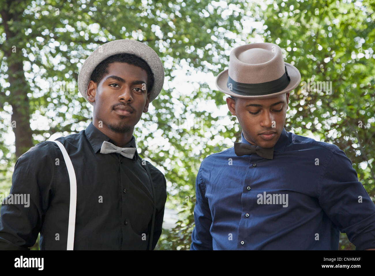 Men in black hats hi-res stock photography and images - Alamy