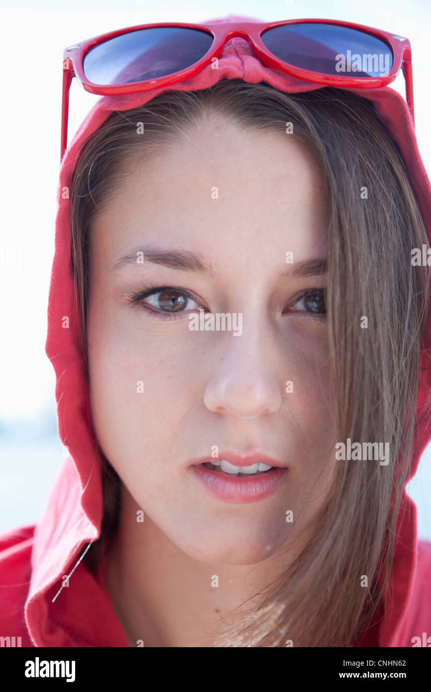 Portrait of girl in red hooded shirt Stock Photo Alamy