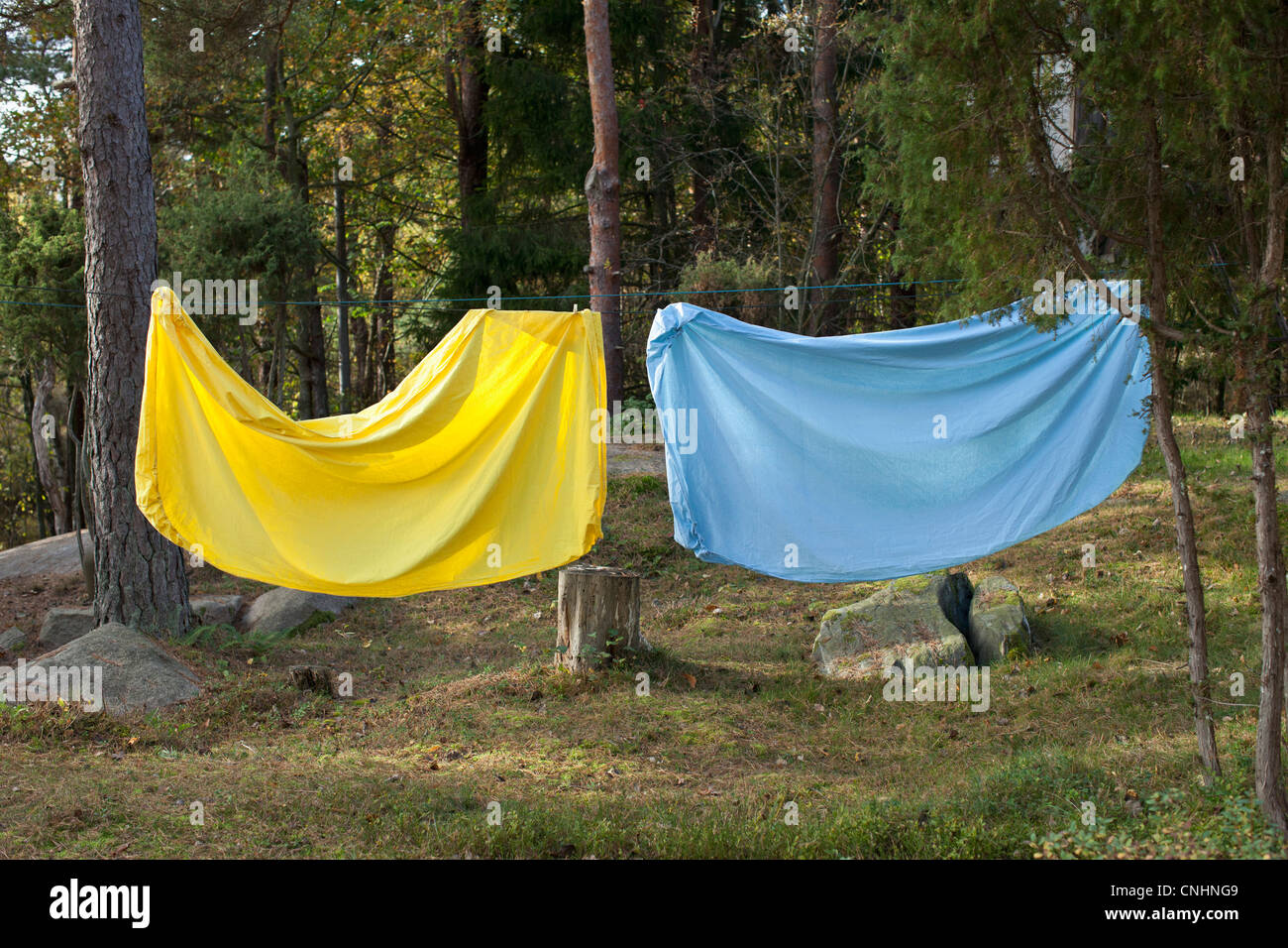 Bed Sheet Hanging On A Clothes Line Stock Photo 47718617