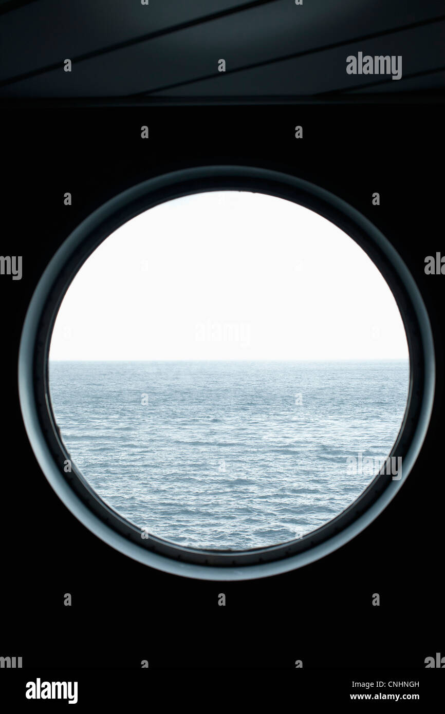 View of the sea through a porthole Stock Photo