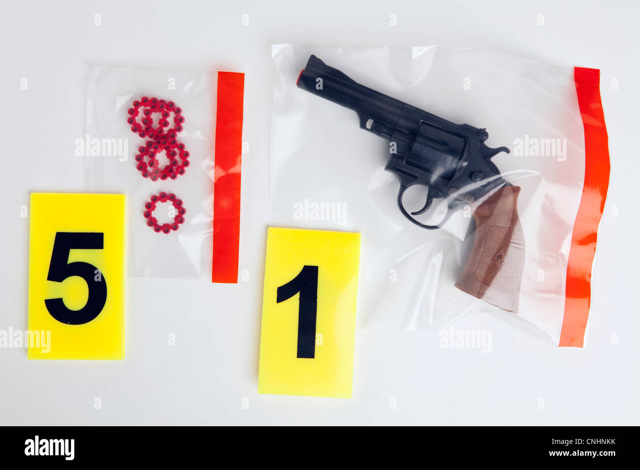 A BB Gun and BB cartridges in evidence bags Stock Photo Alamy