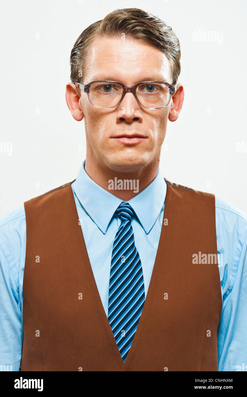 A retro looking man in a vest and shirt and tie Stock Photo