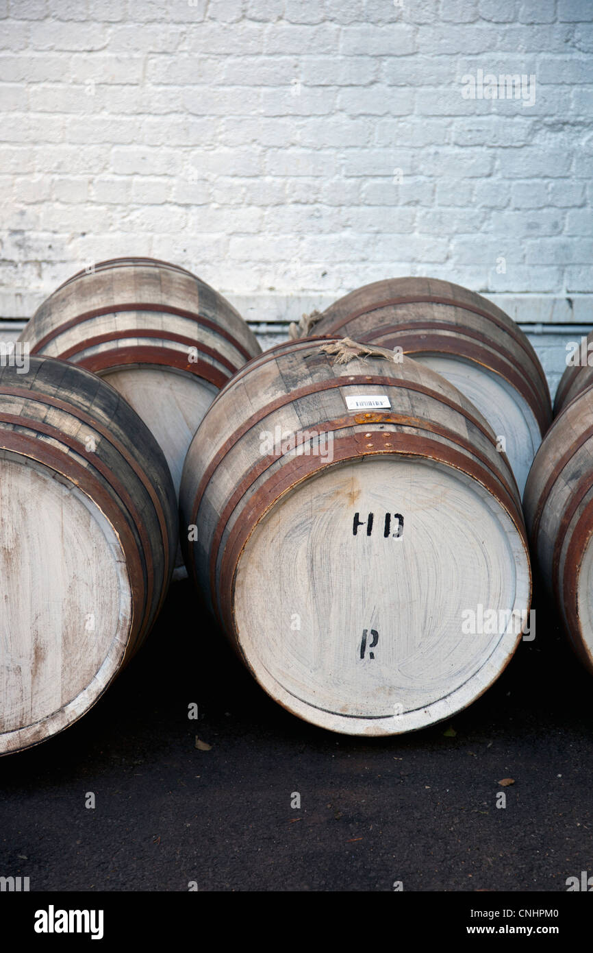 Wooden barrels at a whiskey distillery Stock Photo