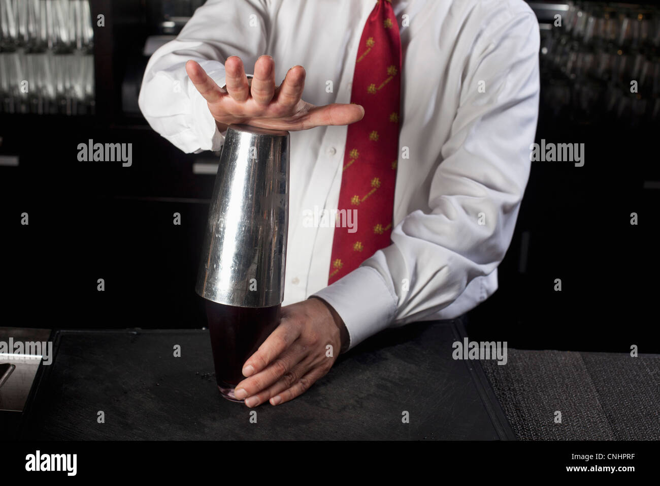 Detail of a bartender making a drink, midsection Stock Photo