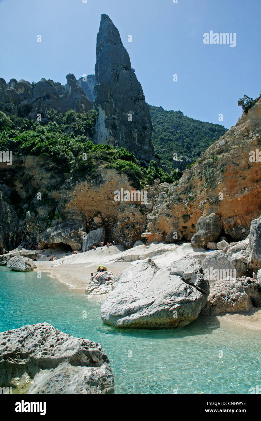Monte Caroddi Aguglia rocky pinnacle at Cala Goloritze beach, Baunei coast,Orosei gulf, Sardinia, Italy, Europe. Stock Photo