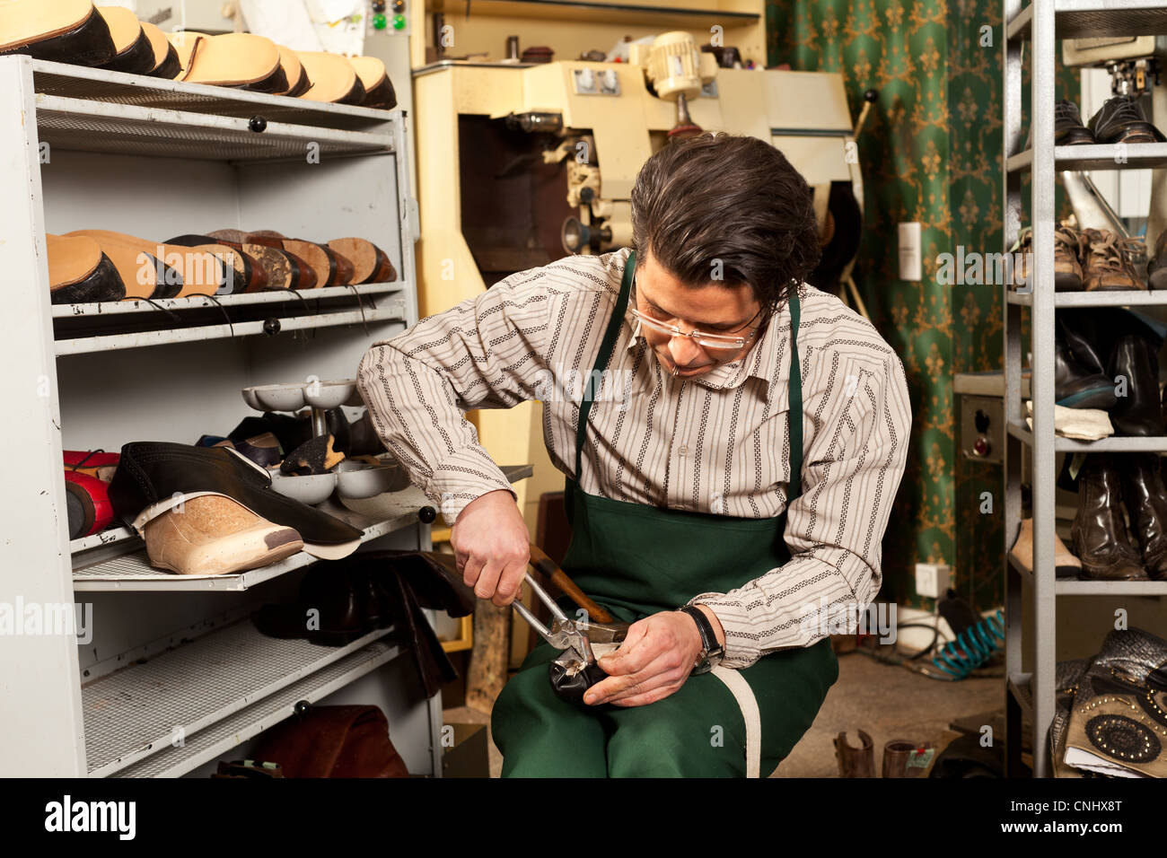 Shoe repair man hires stock photography and images Alamy