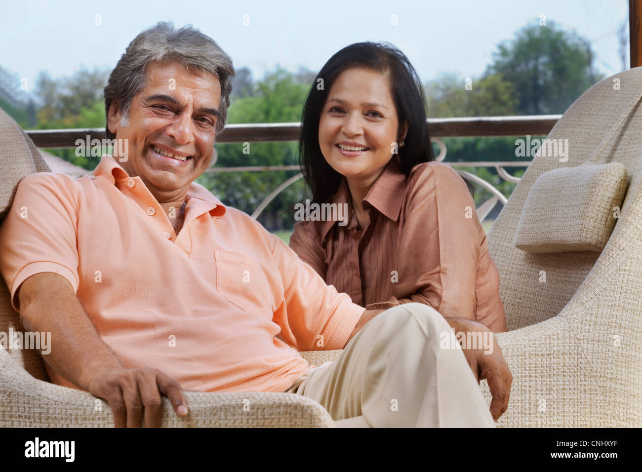 Portrait of mature couple smiling Stock Photo