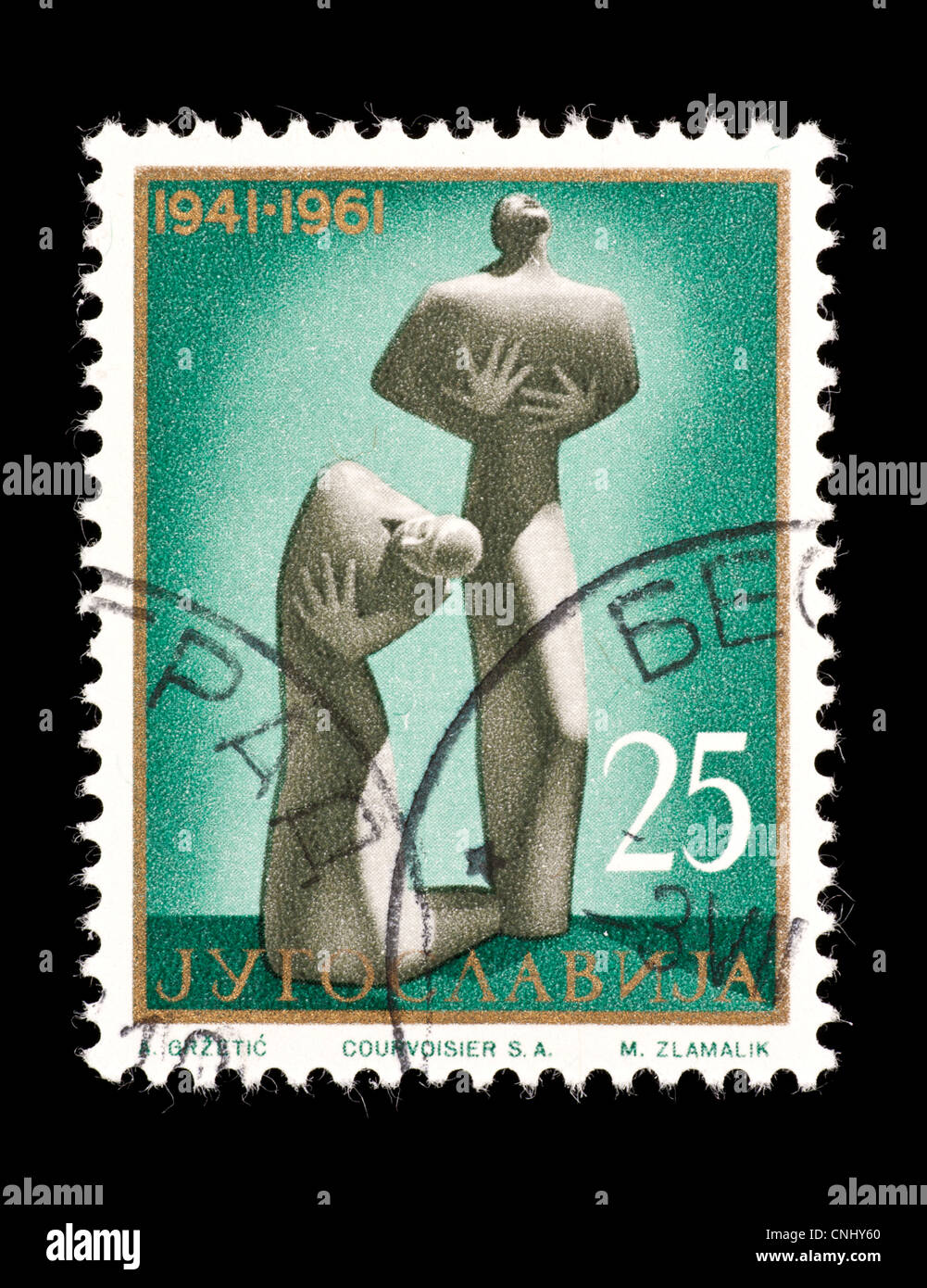 Postage stamp from the former Yugoslavia depicting the victim's monument in Kragijevac. Stock Photo