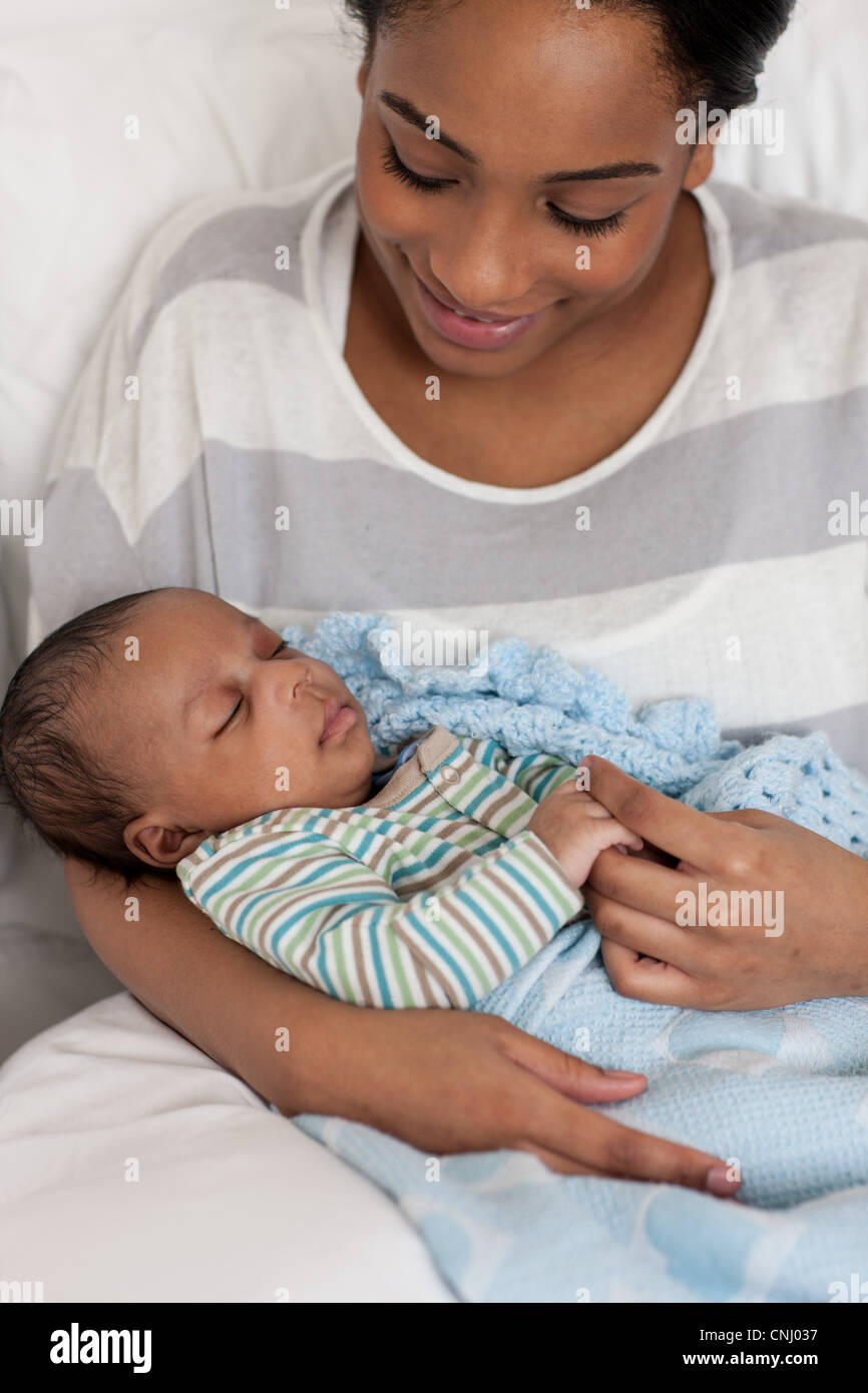 Mother holding baby boy Stock Photo Alamy