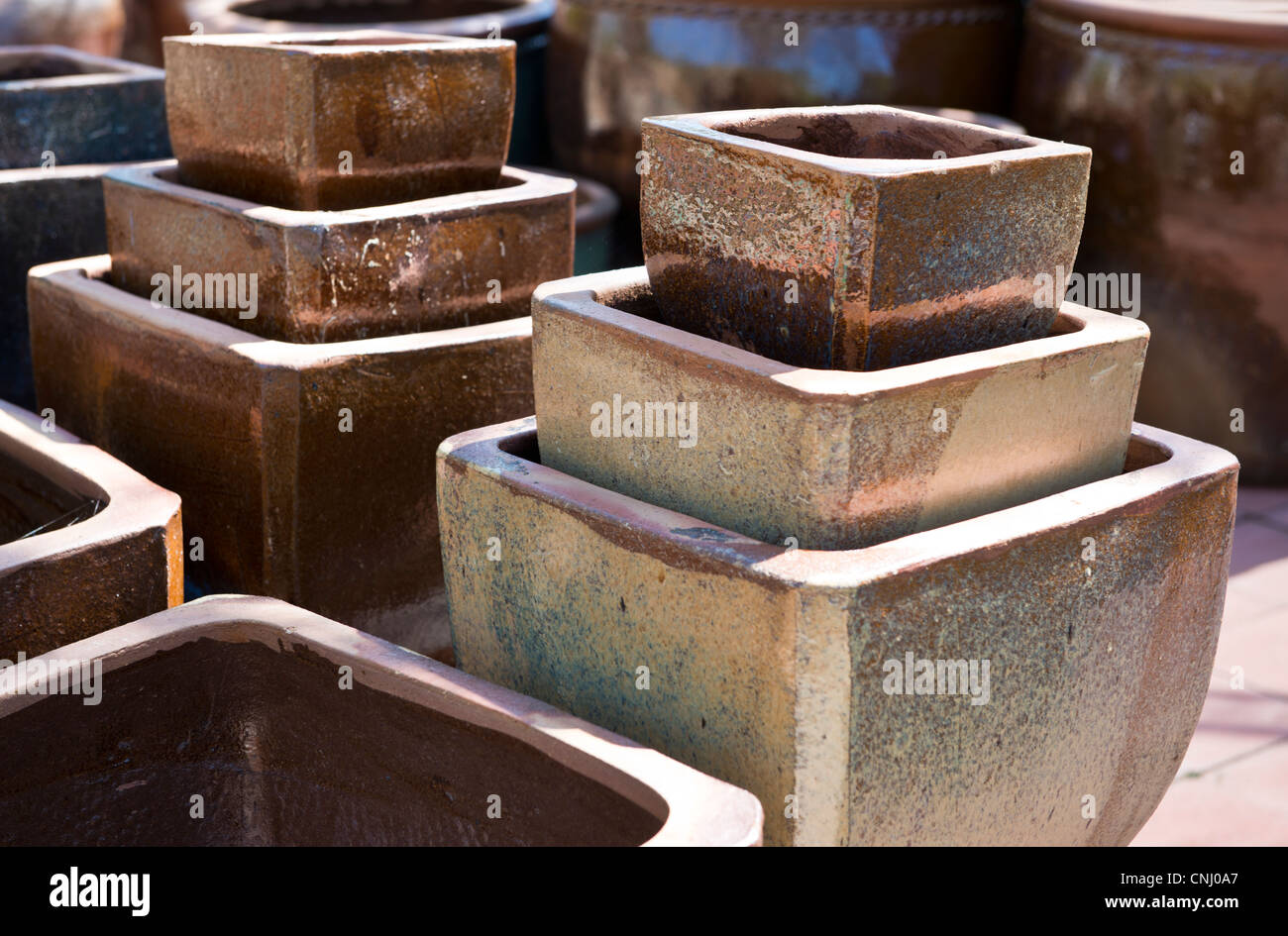 Ceramic pots in many colors, shapes, and sizes Stock Photo Alamy
