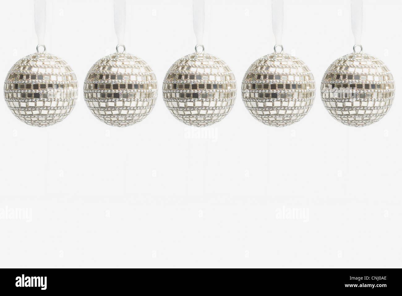 Five disco ball christmas baubles Stock Photo
