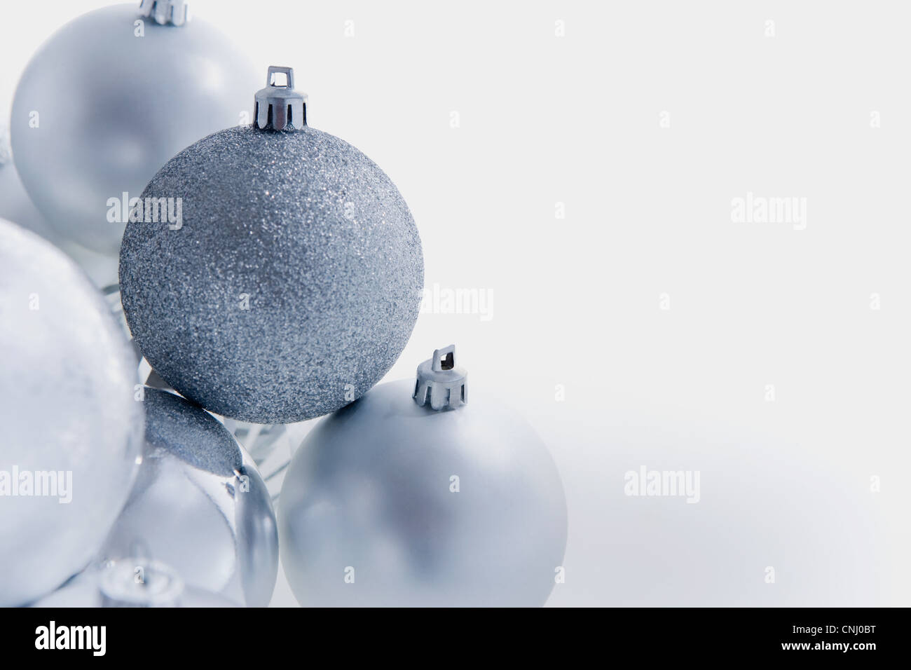 Silver christmas baubles Stock Photo