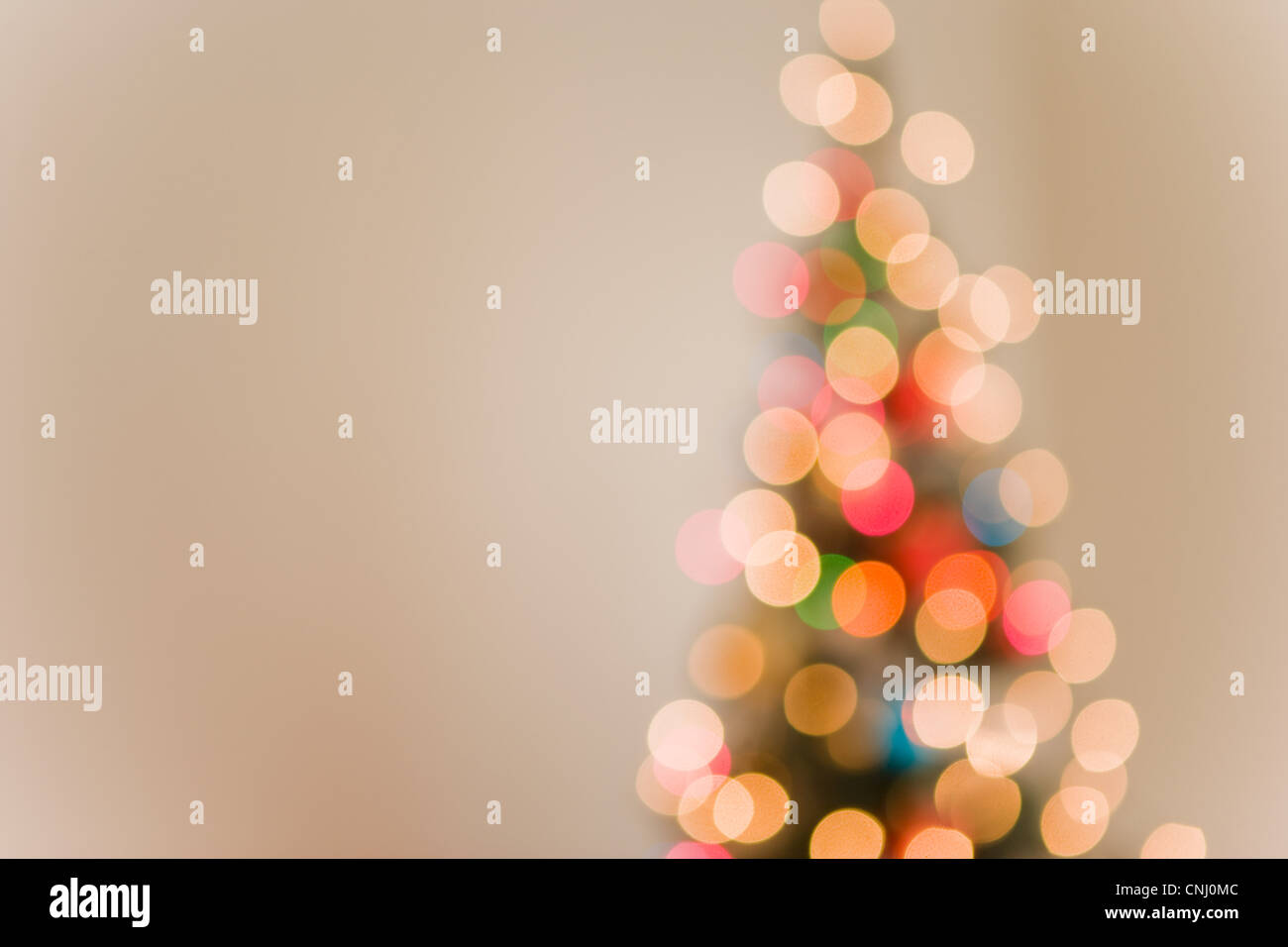 Christmas lights on tree, out of focus Stock Photo