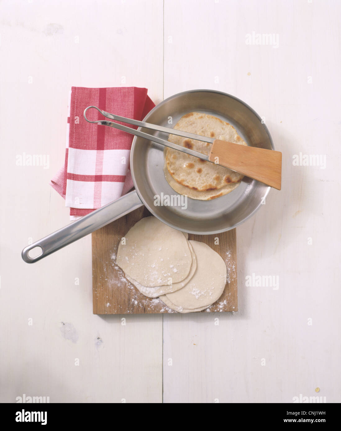 Heating the pita bread Stock Photo Alamy