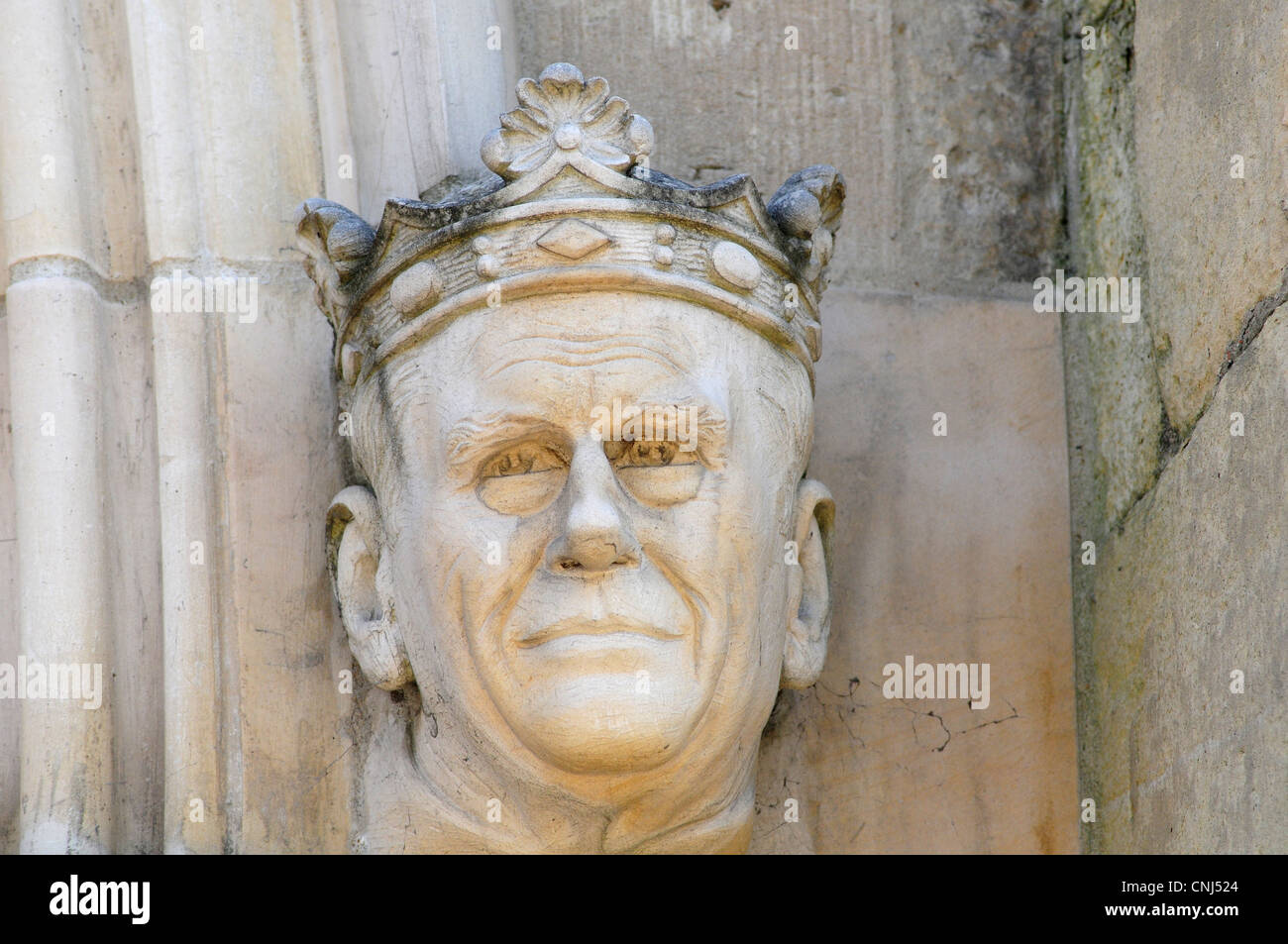Sculptured likeness of Prince Philip Duke of Edinburgh on the West Door or Galilee of Chichester Cathedral Stock Photo
