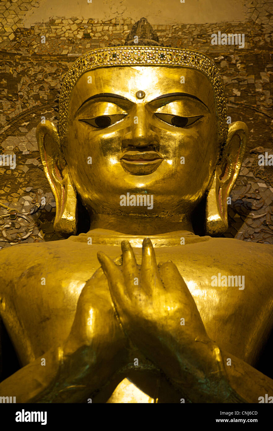 Giant standing buddha Kassapa inside Ananda temple, Pagan, Burma. Bagan, Myanmar. Stock Photo