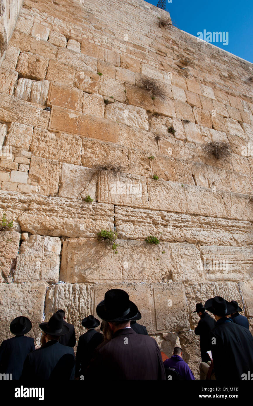 Middle East Israel Old Jerusalem - The Western Wall, Wailing Wall or Kotel -religious Jews pray at this holy site Stock Photo