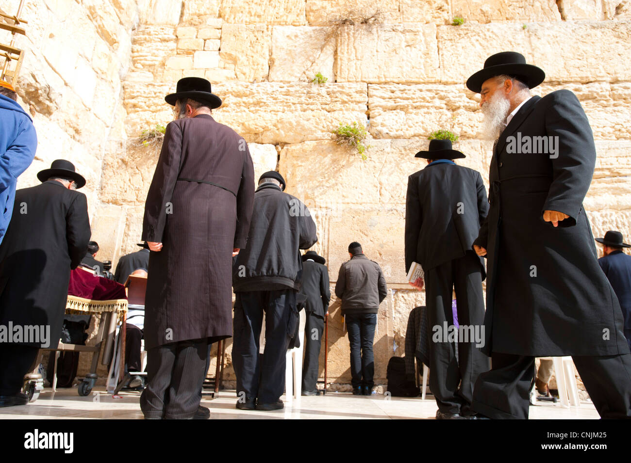 Middle East Israel Old Jerusalem - The Western Wall, Wailing Wall or Kotel -religious Jews pray at this holy site Stock Photo