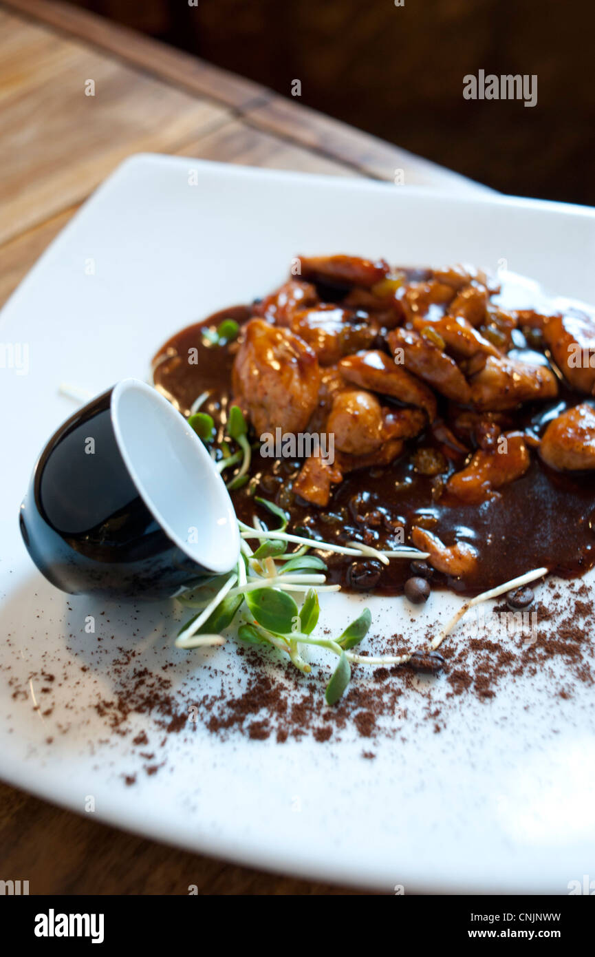 Middle East - Israel - Nazareth - Restaurant Tishreen - Middle Eastern food dishes  chicken in a coffee and plum sauce Stock Photo