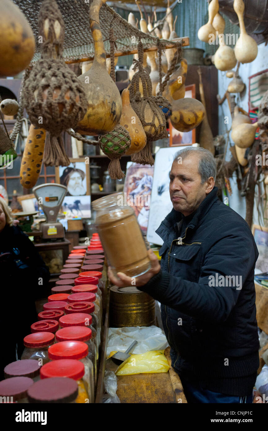 Middle East Israel Akko (Acre) - Spice shop in the souk - owner Kurdi Hamudi tends to his small but well stocked shop of spices Stock Photo
