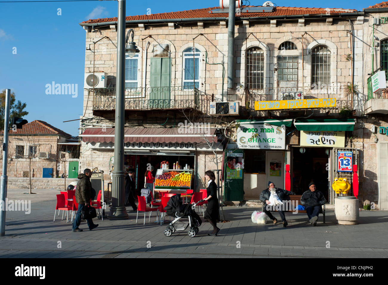 Middle East Israel Jerusalem Yafo near Mehane Yehuda street scene woman with a stroller Stock Photo