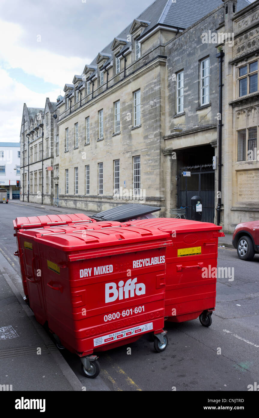 Red Biffa waste recycling wheelie bins in the street Stock Photo