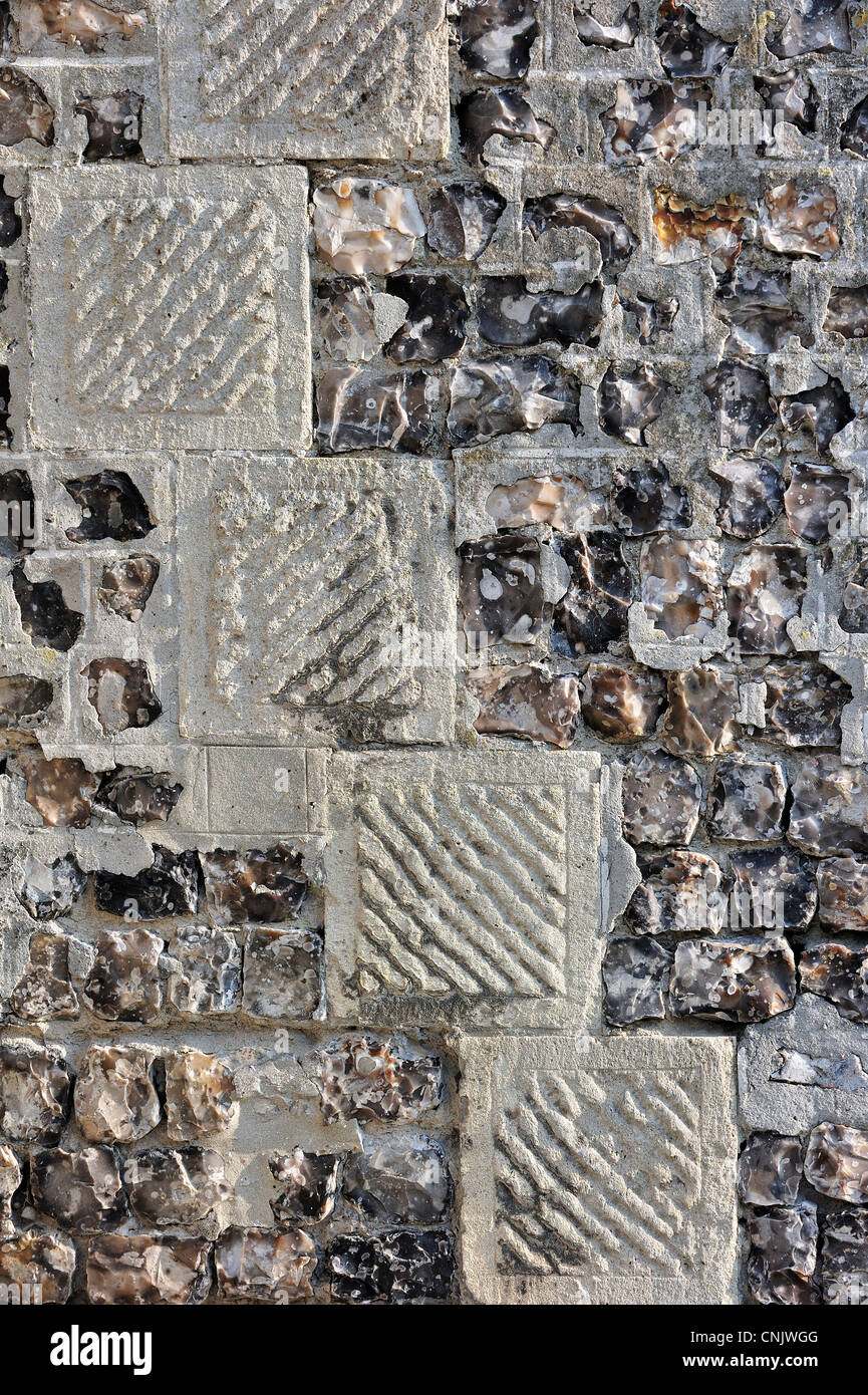 Detail showing sandstone and flint as traditional building material of the Saint Jacques church at Le Tréport, Normandy, France Stock Photo