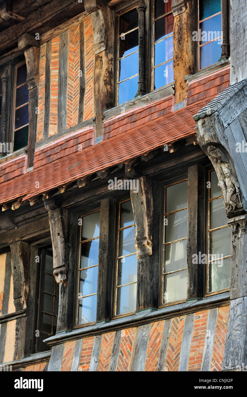 Medieval timber frame restaurant Manoir de la Salamandre showing carvings at Etretat, Côte d'Albâtre, Upper Normandy, France Stock Photo