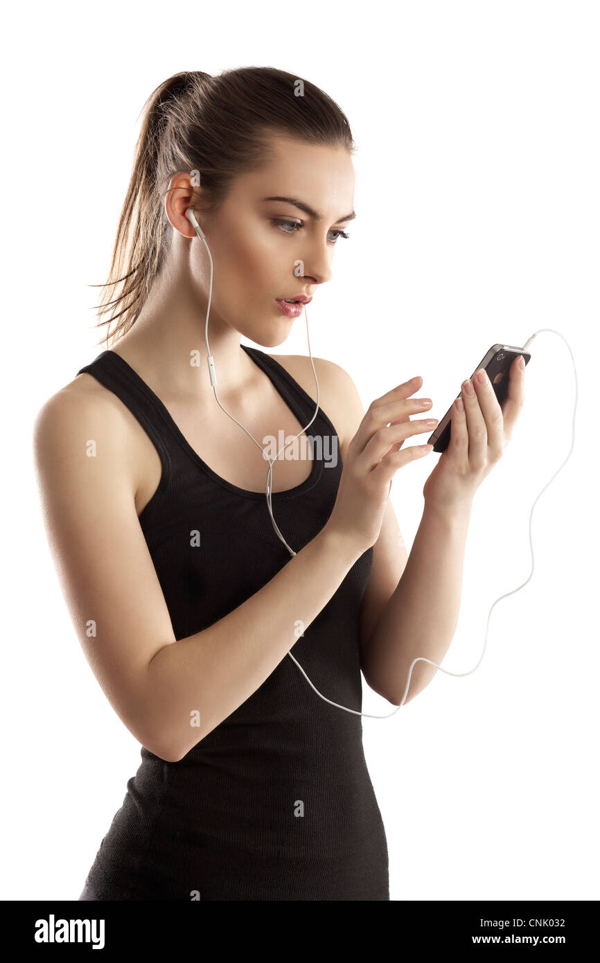 Beautiful young woman tracking her calorie after exercise withher