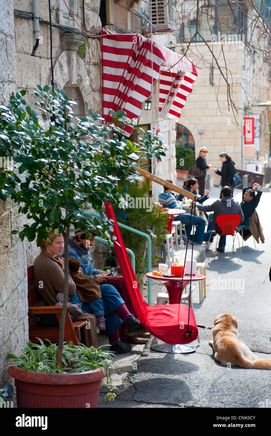 Middle East Israel Jerusalem village of Ein Karem - birthplace of John the Baptist - people sitting outside at cafes Stock Photo