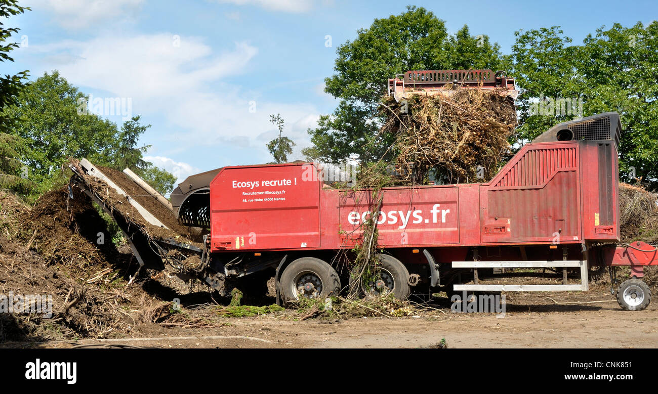 Machine to make compost, grinding of plants Stock Photo Alamy