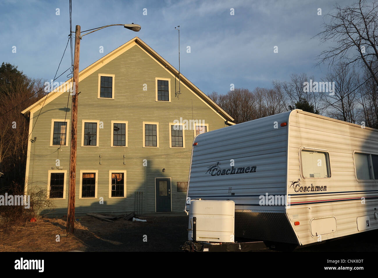 A trailer and a building in the small Western Massachusetts town of Colrain. Stock Photo