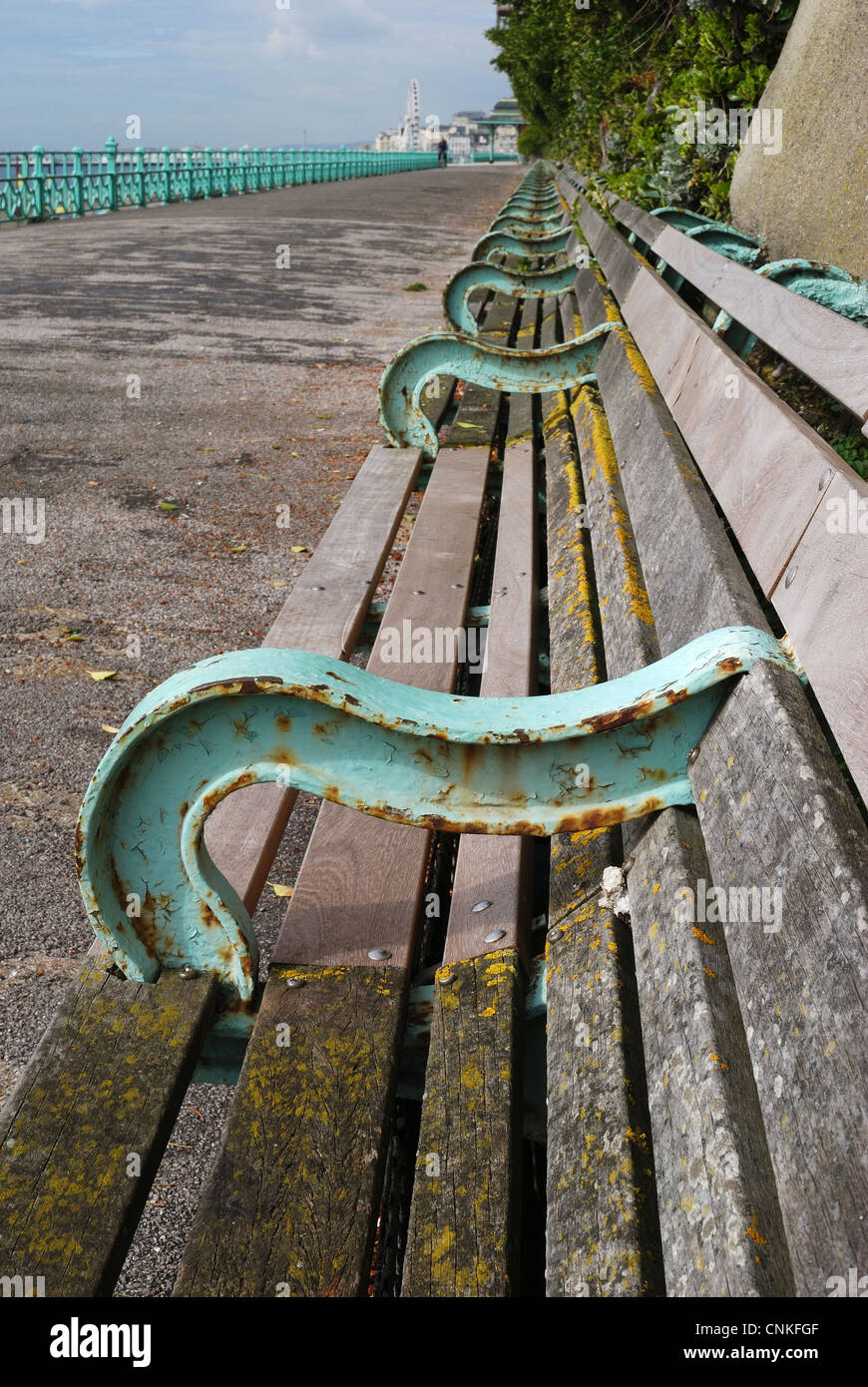 Row of benches on the promenade of Brighton seafront. East Sussex