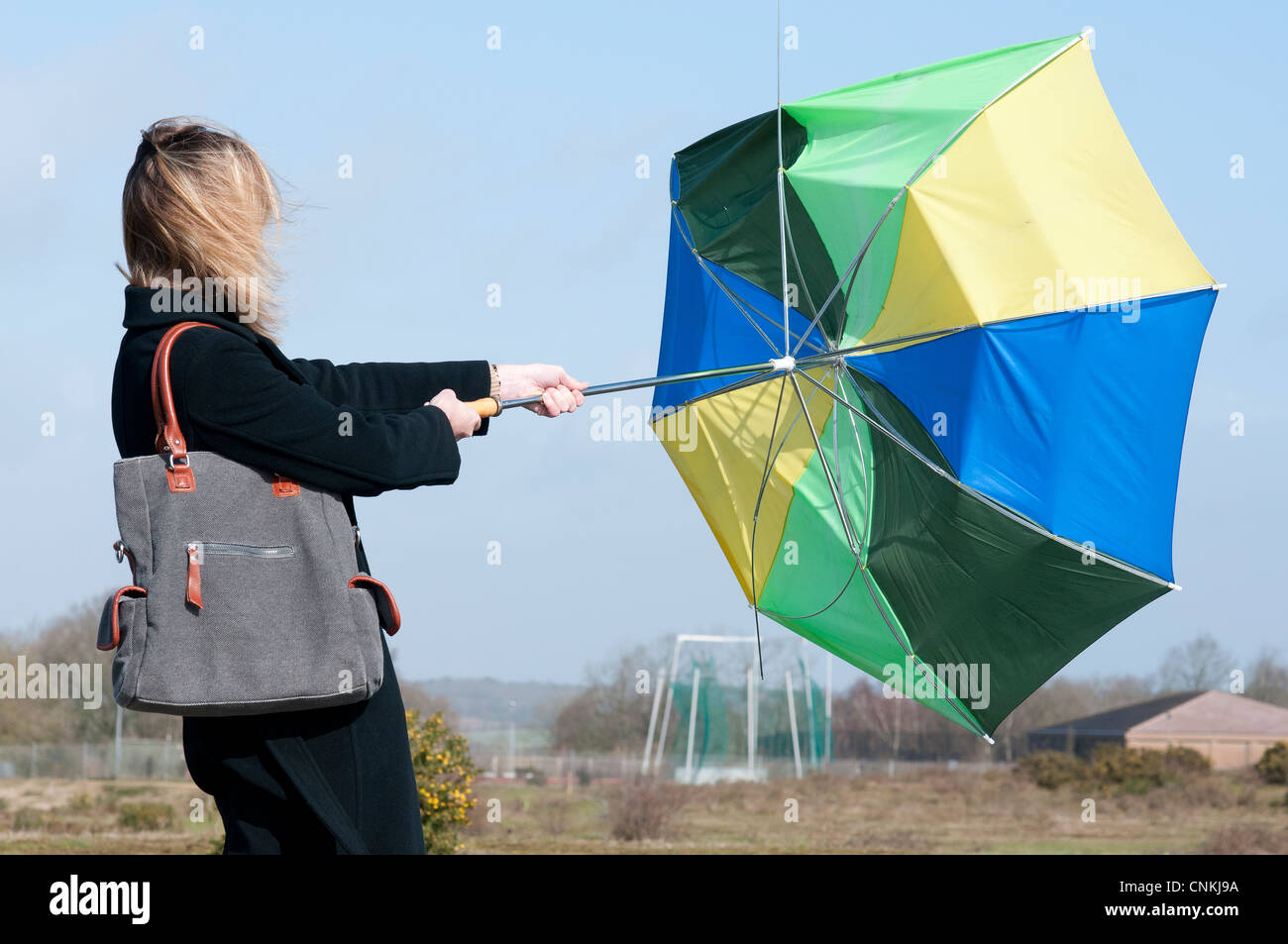 Umbrella blowing inside out hires stock photography and images Alamy