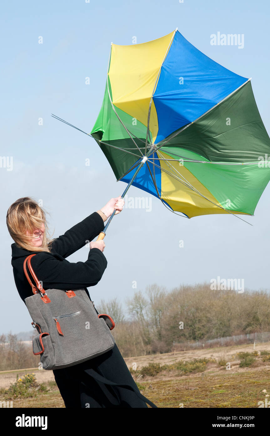 Umbrella blowing inside out hires stock photography and images Alamy