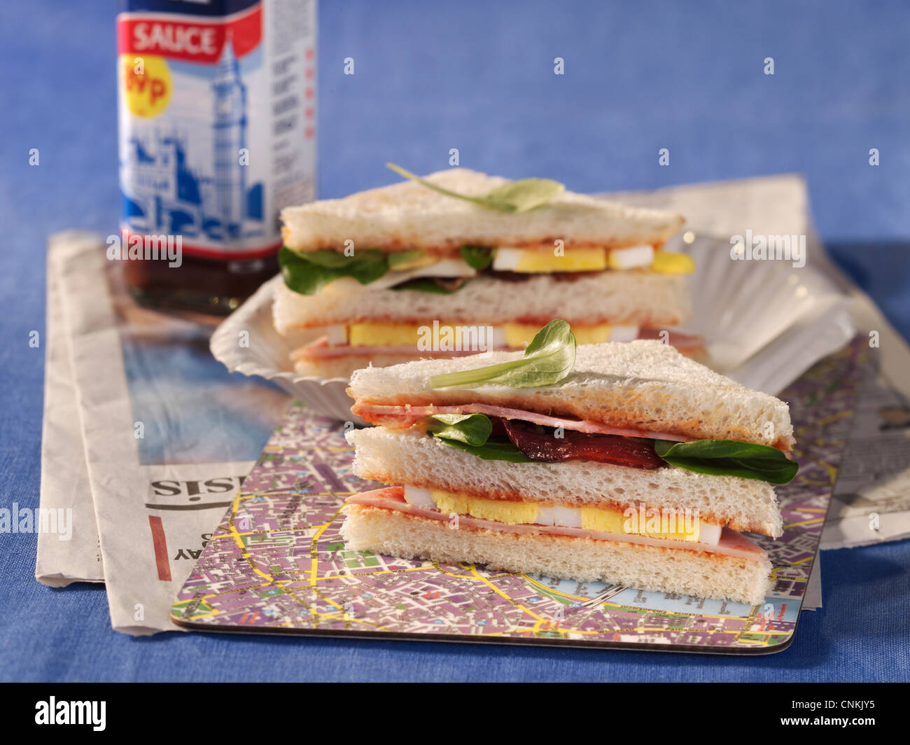 Sandwich with egg, bacon and ham Stock Photo