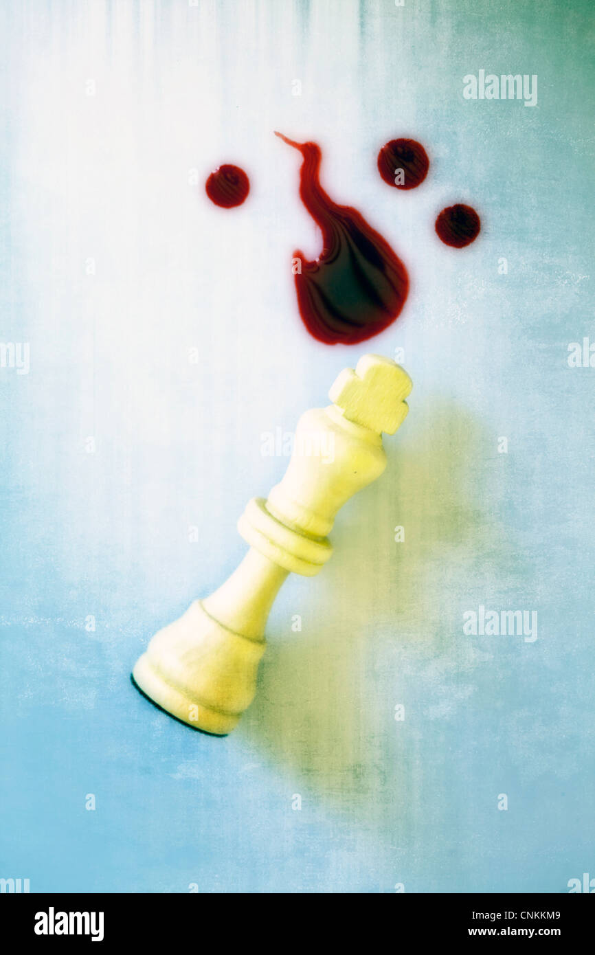 the king of a chessgame with blood Stock Photo