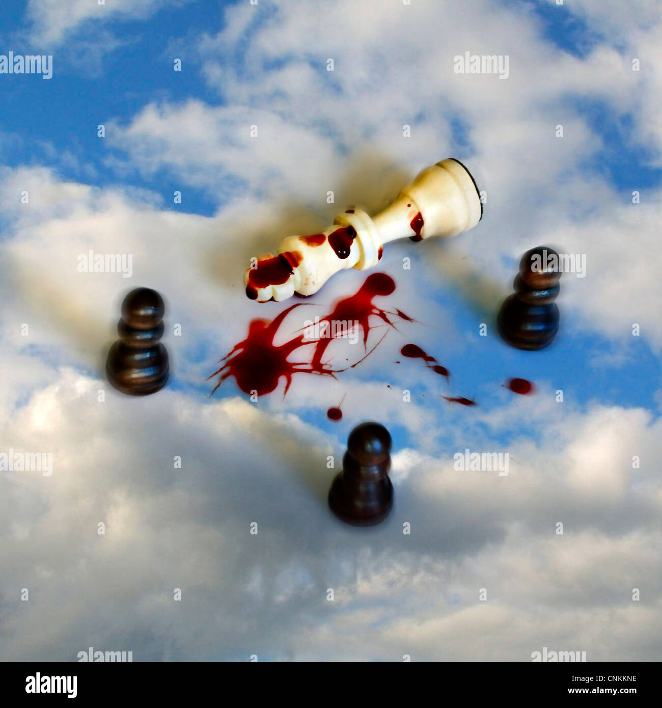 the white king of a chess game with blood Stock Photo