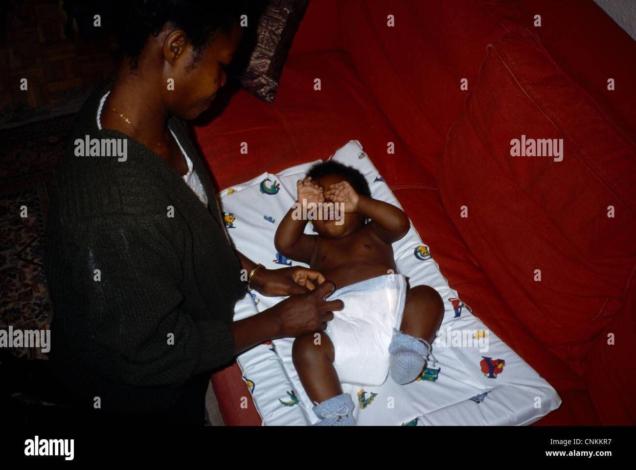 Changing A Nappy Afro Caribbean Nappy Stock Photo